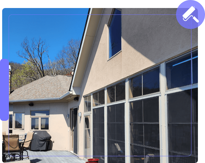 A house with a patio and lawn furniture.